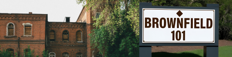 Brick building with sign that says "Brownfields 101"